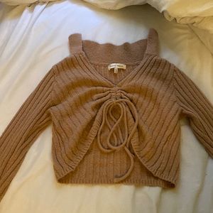 A brown long sleeve crop top